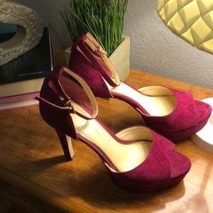 Burgandy/wine color heels. Shoes are worn